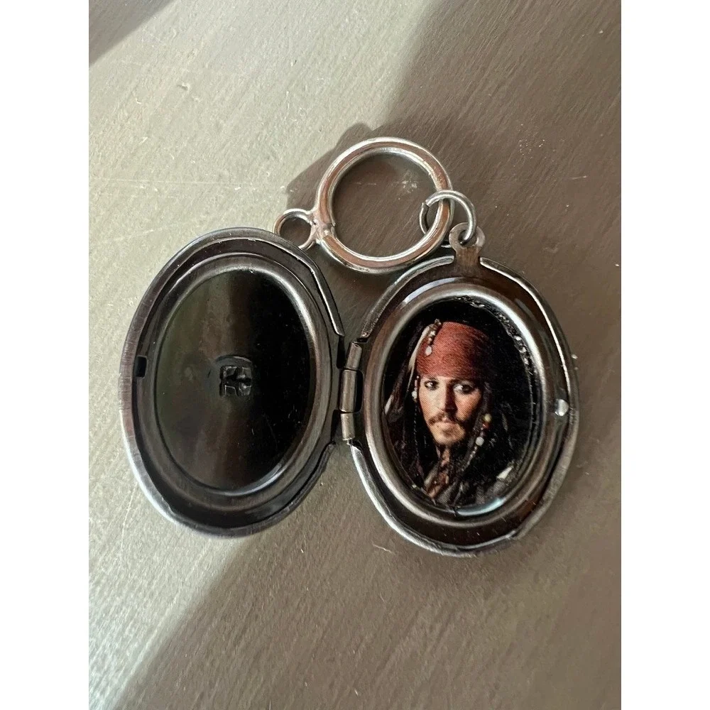 Disney Pirates of the Caribbean Locket Keychain Jack Sparrow Skull Silver Tone